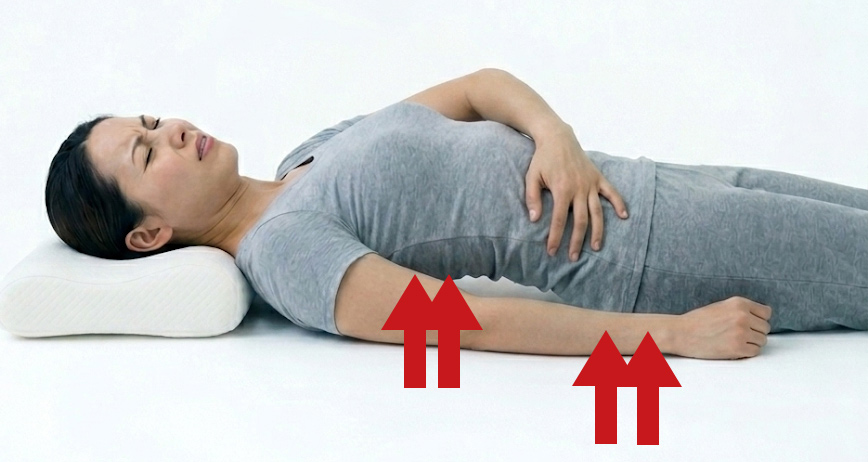 背中・腰が圧迫されて呼吸がしづらいイメージ